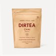 A package of DIRTEA Chai Turmeric Mushroom Superblend tea, with a beige background and text detailing the product name and its benefits such as 'Energy', 'Focus', and 'Calm'.