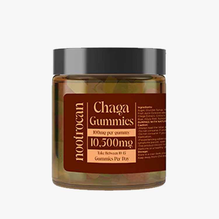 A clear amber glass jar of Nootrocan Chaga Nootropic Mushroom Gummies with a black lid and a label showing the product details.