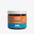 A container of Orange County NMN (Nicotinamide) Gummies with the label showing the product name, quantity of 30 pieces, and each piece containing 400mg of NMN.