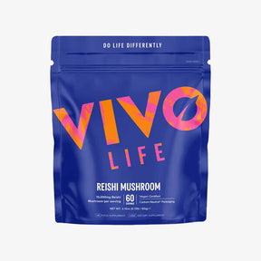 A blue package of Vivo Life Reishi Mushroom powder with vibrant orange and pink text displaying the product name and benefits.