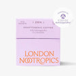 A box of Zen Adaptogenic Coffee by London Nootropics, containing 12 sachets. The packaging is purple and orange with text detailing the product name and adaptogenic ingredients such as Ashwagandha and L-theanine.